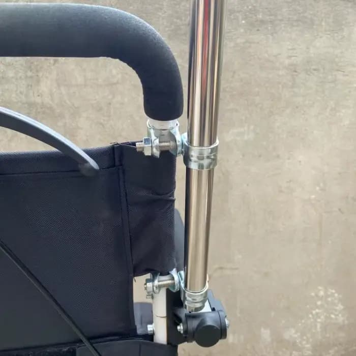 Poignée universelle en acier inoxydable pour fauteuil roulant