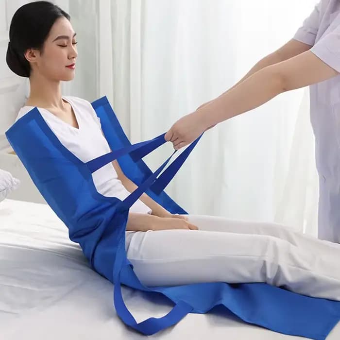 Ceinture de levage sécurisée pour transfert de patient au lit
