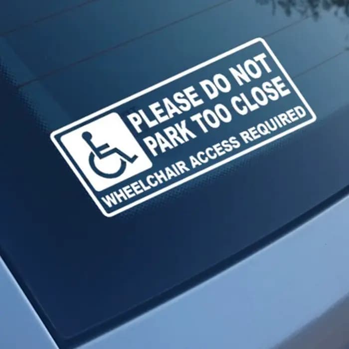 Autocollants d'accès pour fauteuil roulant requis