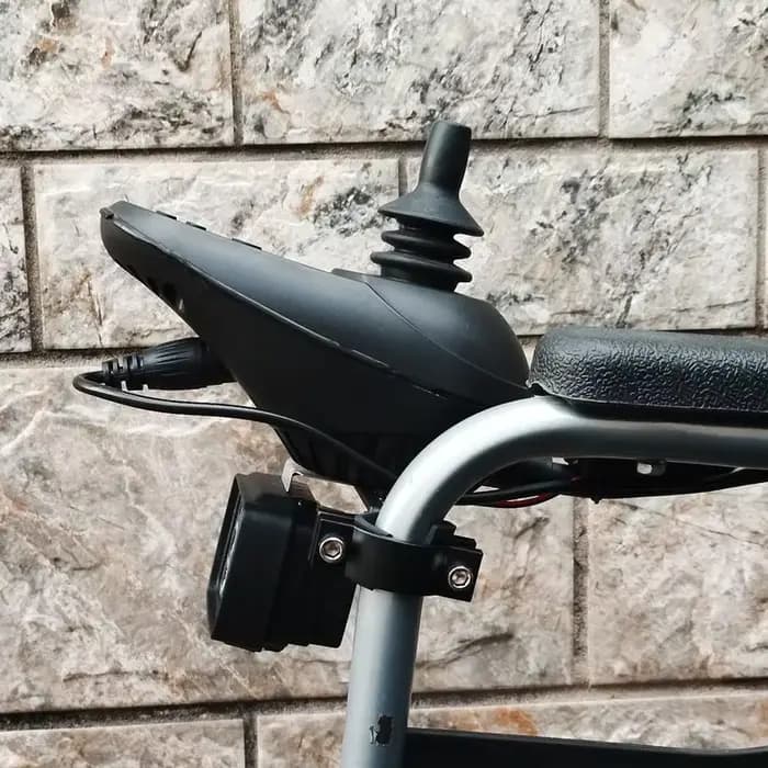 Lampe d'éclairage pour fauteuil roulant électrique