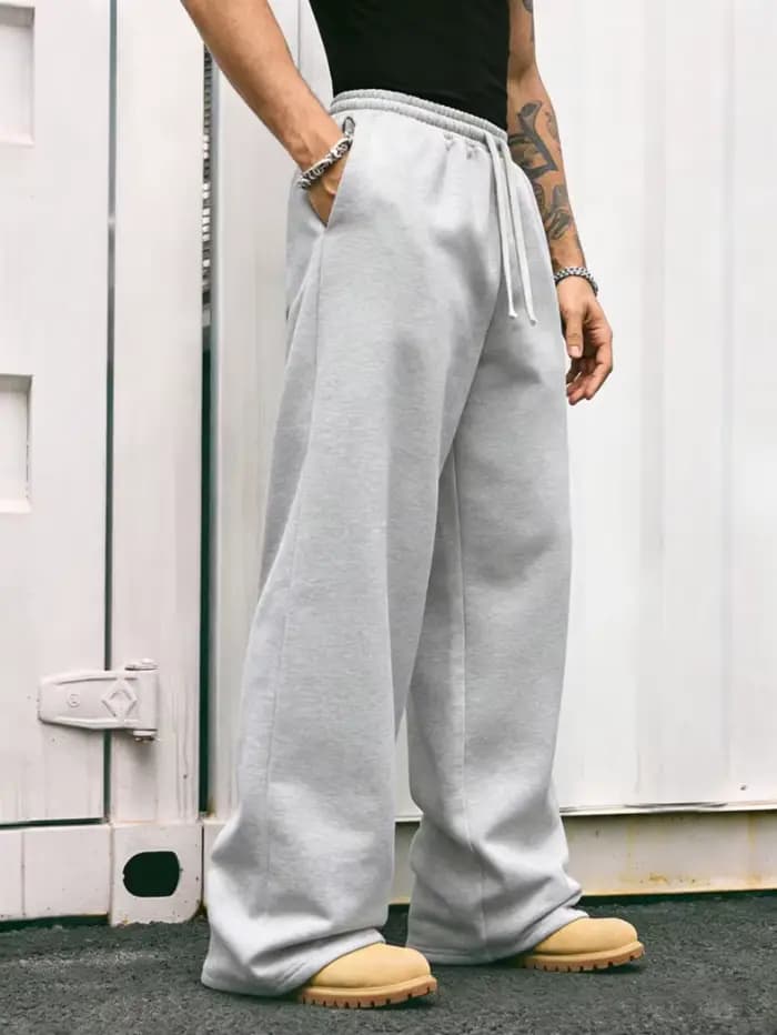 Pantalon cargo confortable pour homme, coupe droite, avec une taille ample et un cordon de serrage élastique – idéal pour les trajets quotidiens.