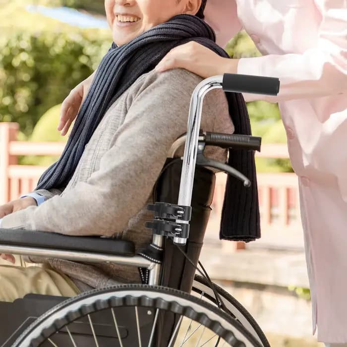 Extension de poignée de fauteuil roulant en acier inoxydable